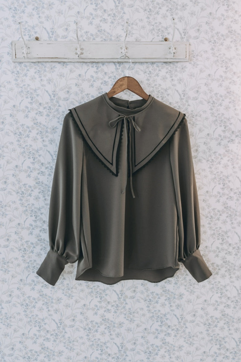falling collar high neck blouse